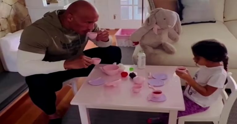 During a tea party with his four-year-old daughter Tiana, Dwayne ‘The Rock’ Johnson takes a sip from a little pink cup.