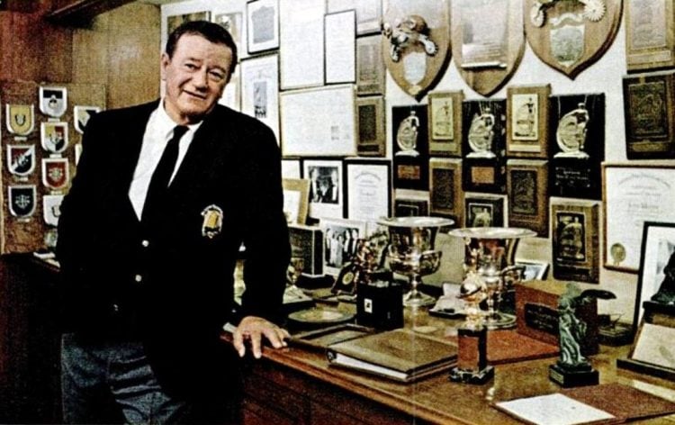John Wayne in 1969 with his awards