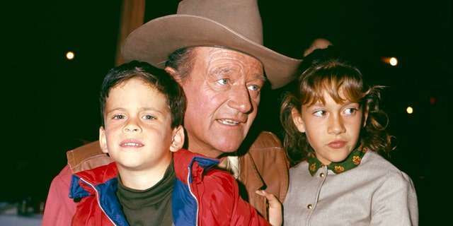 John Wayne with children