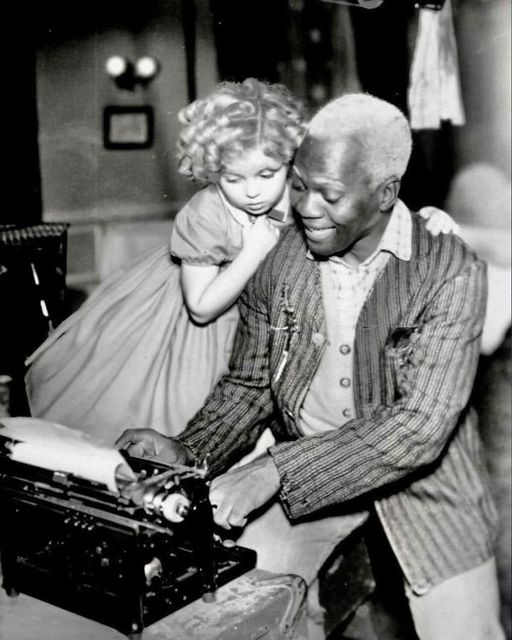 Bill “Bojangles” Robinson and Shirley Temple in the 1935 film “The Littlest Rebel.”