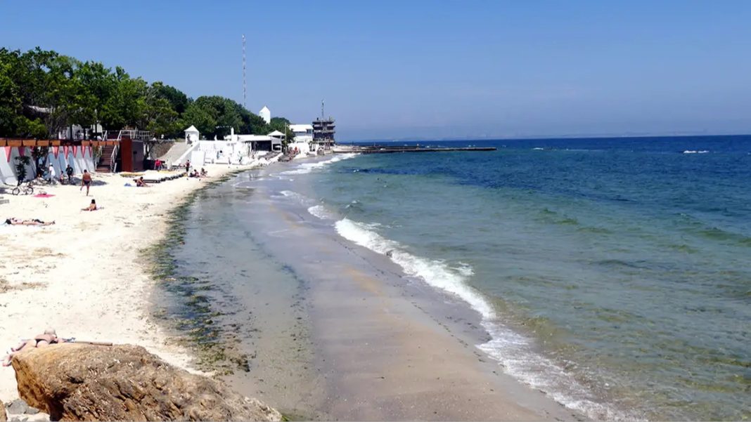 Three beachgoers dead after sea mines wash up on beach and explode at popular tourist spot - featured image