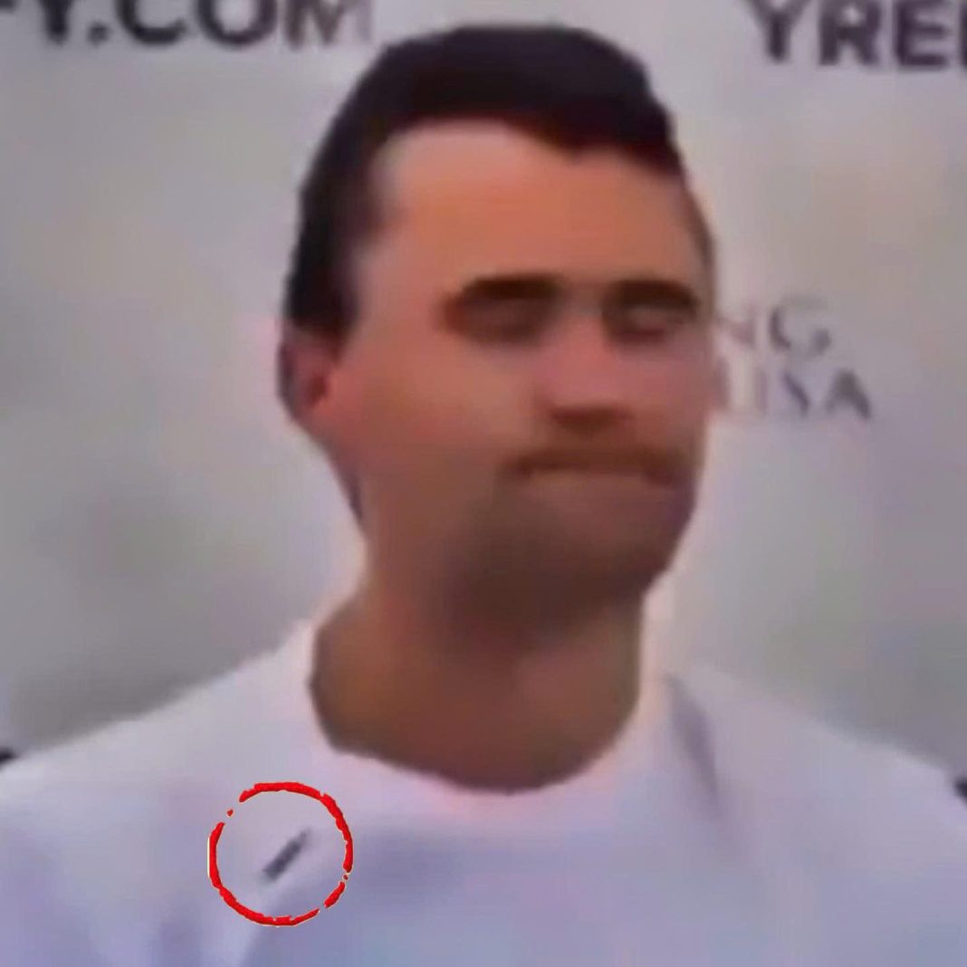 New Slow Motion Video Appears To Show Bullet Ricocheting Off Charlie Kirk’s Bulletproof Vest & Into His Neck - featured image