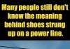 The Meaning Behind Shoes Strung Up On A Power Line The Meaning Behind Shoes Strung Up On A Power Line - featured image