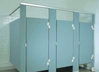 Why do public bathroom doors not reach the floor? Why do public bathroom doors not reach the floor? - featured image