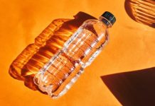 Why You Should Toss a Water Bottle Under Your Hotel Bed Why You Should Toss a Water Bottle Under Your Hotel Bed - featured image