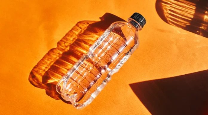 Why You Should Toss a Water Bottle Under Your Hotel Bed Why You Should Toss a Water Bottle Under Your Hotel Bed - featured image