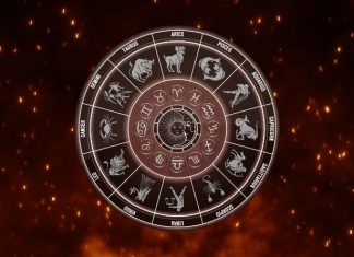 LOVE WAS WRITTEN IN THE STARS — Every Zodiac Sign Is About to Discover What Fate Has Planned! Glowing zodiac wheel with astrological symbols surrounded by warm orange sparks on a dark cosmic background