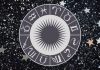 Daily Horoscope for September 1: This Is Not the September You Expected White zodiac wheel with astrological symbols surrounded by stars on a dark cosmic background