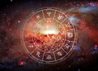 Daily Horoscope for September 2: You May Not See This Surprise Coming Glowing zodiac wheel with astrological symbols surrounded by fiery orange and red cosmic energy