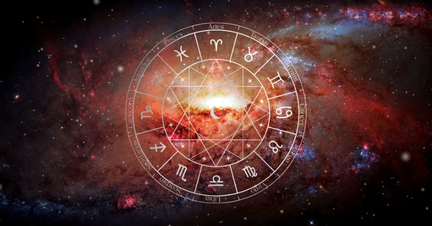 Daily Horoscope for September 2: You May Not See This Surprise Coming Glowing zodiac wheel with astrological symbols surrounded by fiery orange and red cosmic energy