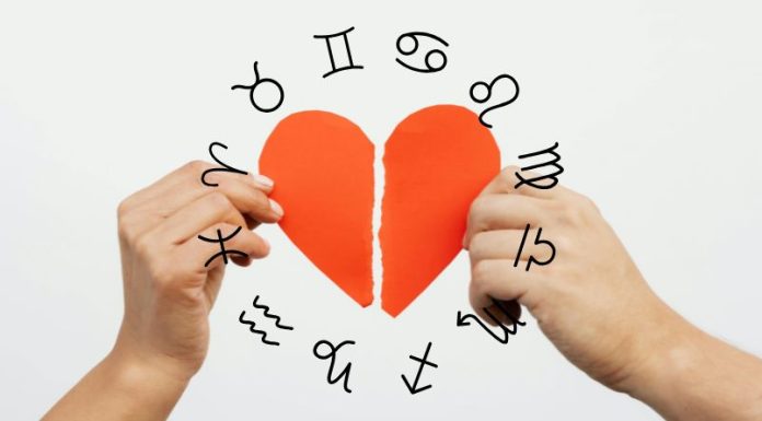 September Begins With a New Chapter for Every Zodiac Sign Two hands tearing a red paper heart in half with zodiac symbols around it on a light background
