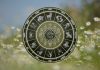 THE ATTRACTION WILL BE UNDENIABLE: These Zodiac Signs Are About to Fall Hard Golden zodiac wheel with astrological symbols surrounded by soft wildflowers and warm natural light