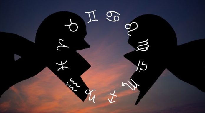IF THIS ANGEL NUMBER KEEPS APPEARING, SOMETHING BIG IS COMING Silhouetted couple facing each other with zodiac symbols and a broken heart between them against a dramatic cosmic background