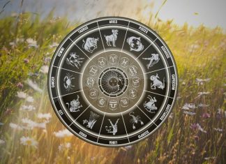 The Tension Is About to Explode — Someone Will Finally Reveal Who They Really Are Glowing zodiac wheel with astrological symbols above a dramatic landscape with warm golden light
