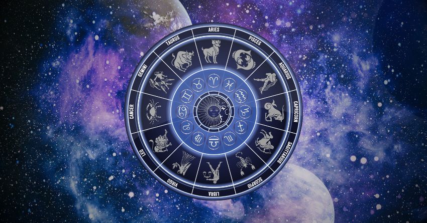 KEEP SEEING THIS ANGEL NUMBER? SOMETHING HUGE IS ABOUT TO HAPPEN Glowing blue zodiac wheel with astrological symbols surrounded by purple and blue cosmic energy